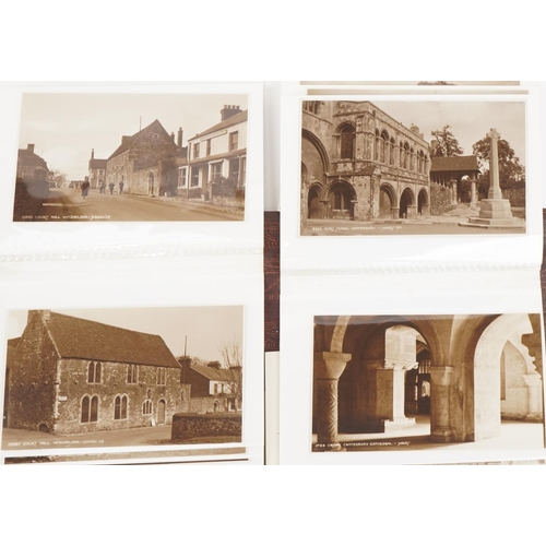 1614 - Collection of topographical social history postcards arranged in three albums including street scene... 