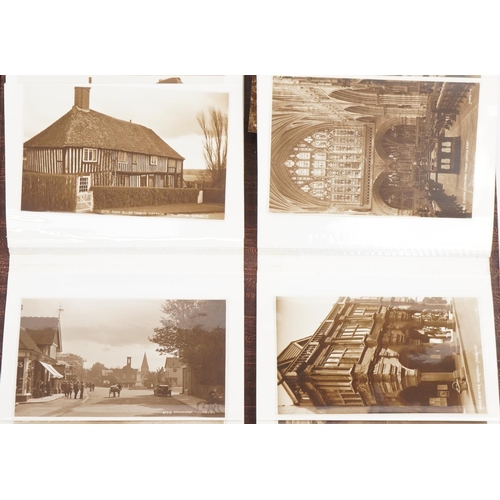 1614 - Collection of topographical social history postcards arranged in three albums including street scene... 