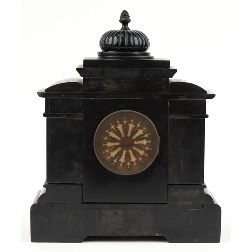 158 - Victorian black slate mantle clock with reeded columns and circular chapter ring having Arabic numer... 