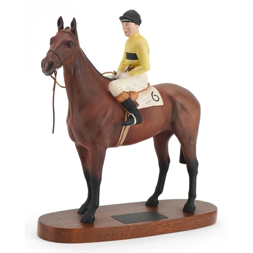 444 - Beswick Connoisseur model of Pat Taaffe on Arkle raised on a hardwood plinth base, 28cm in length