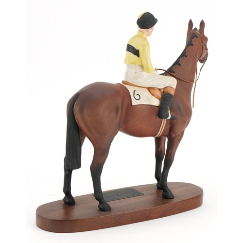 444 - Beswick Connoisseur model of Pat Taaffe on Arkle raised on a hardwood plinth base, 28cm in length