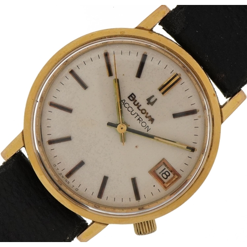 2089 - Bulova, gentlemen's gold Bulova Accutron wristwatch with date aperture housed in a Garrard & Co box,... 