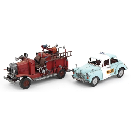 1464 - Tinplate model vintage fire truck and police car, the largest 38cm in length