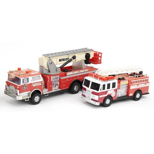 1468 - Four large vintage and later battery operated fire trucks, the largest 68cm in length