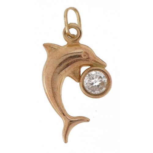 2182 - 9ct gold dolphin pendant set with a clear stone, 2.1cm high, 0.8g