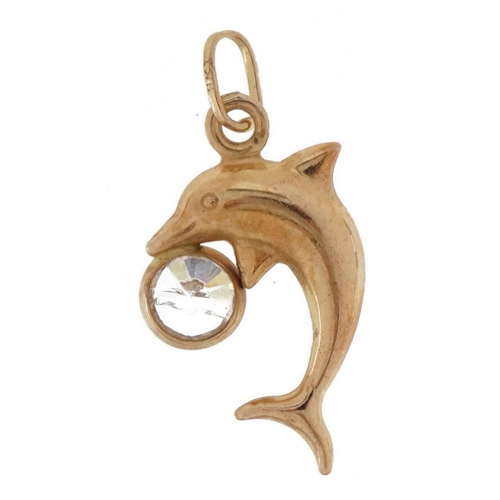 2182 - 9ct gold dolphin pendant set with a clear stone, 2.1cm high, 0.8g