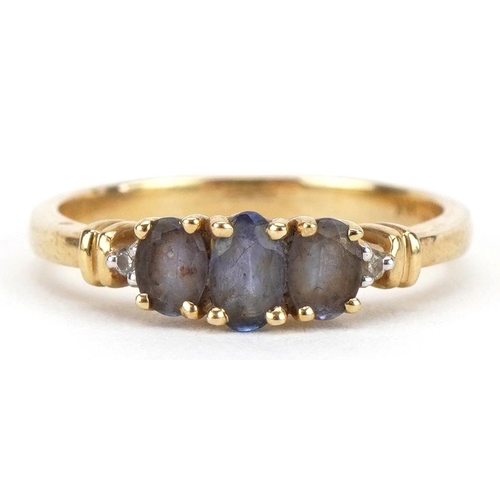 2184 - 14k gold tanzanite and diamond five stone ring, size K/L, 2.1g