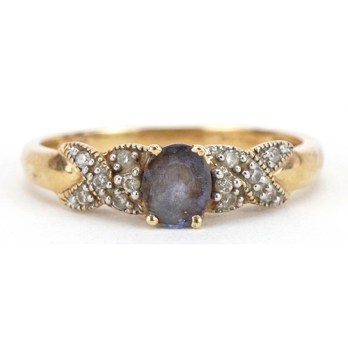 2110 - 14k gold tanzanite ring with diamond shoulders, size L/M, 2.1g