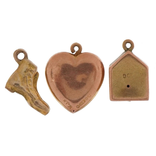 2209 - Three 9ct gold charms comprising love heart, boot and clock, the largest 1.6cm high, total 3.0g