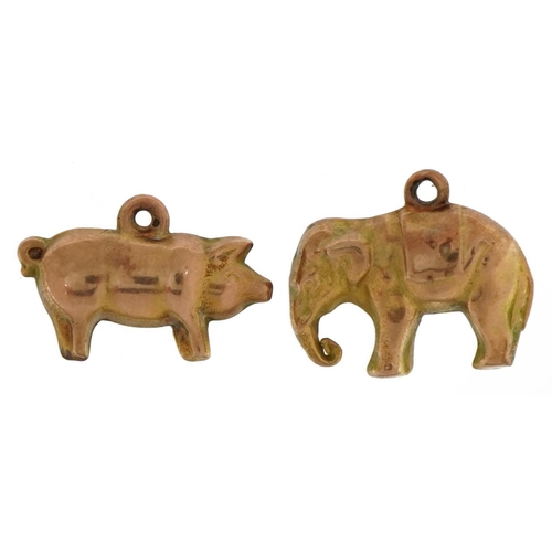 2199 - Two 9ct gold animal charms comprising pig and elephant, the largest 1.8cm wide, total 1.6g