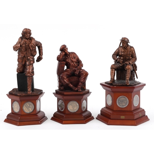 1567 - Three bronzed commemorative military figures raised on hexagonal wooden bases set with coins and med... 