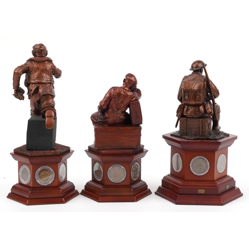 1567 - Three bronzed commemorative military figures raised on hexagonal wooden bases set with coins and med... 