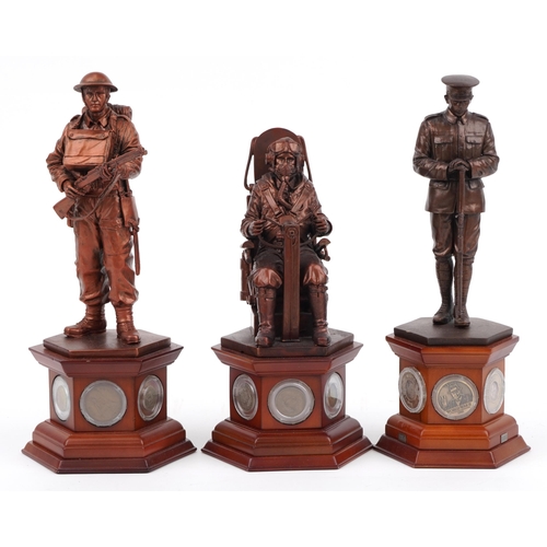 1566 - Three bronzed commemorative military figures raised on hexagonal wooden bases set with coins and med... 