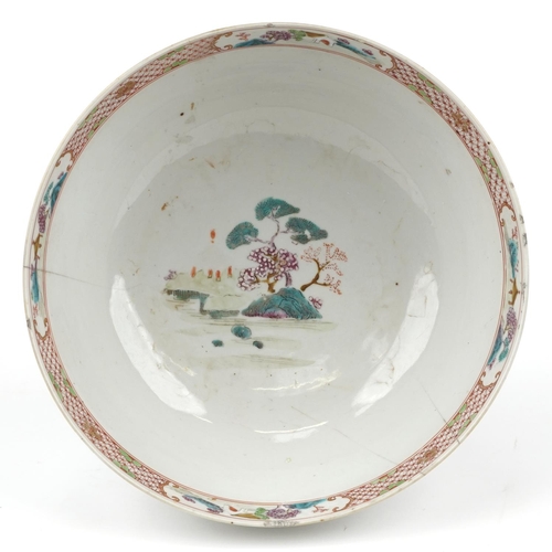 366 - Large Chinese porcelain footed bowl hand painted in the famille rose palette with a continuous river... 