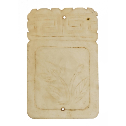 328 - Chinese pale green jade tablet carved with flowers, 7cm x 4.5cm