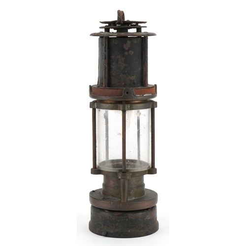 388 - Early 20th century miner's lamp impressed 255, 28cm high