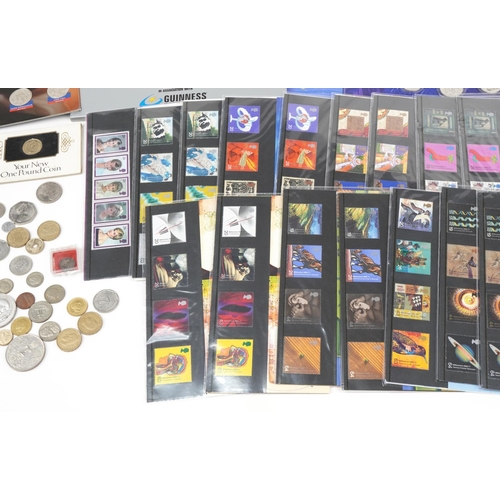 1630 - Coins, stamps and related ephemera including Royal Mint presentation packs and Sainsbury's Makers of... 