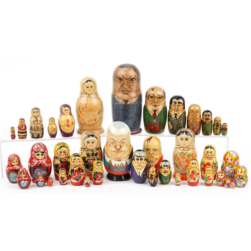 1430 - Ten Russian miniature stacking dolls including political examples, the largest 20.5cm high