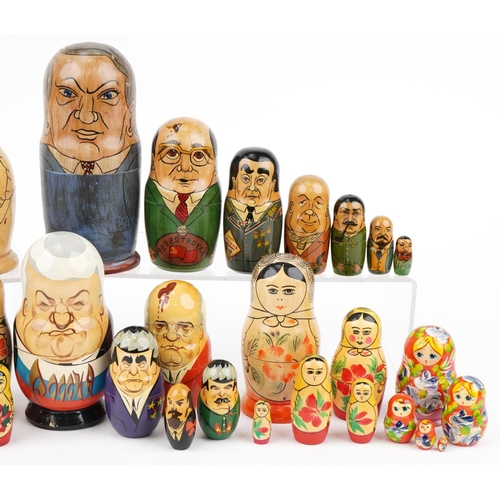 1430 - Ten Russian miniature stacking dolls including political examples, the largest 20.5cm high