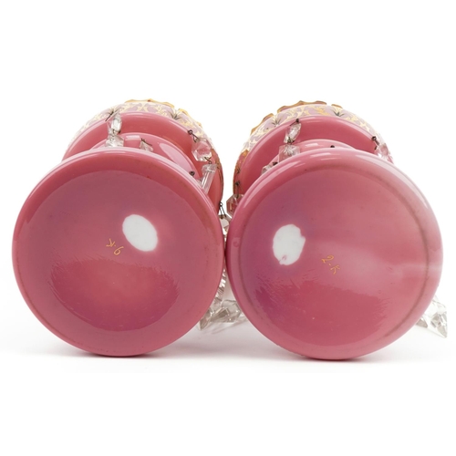 92 - Pair of 19th century pink opaline glass lustres with drops enamelled and gilded with flowers, each 3... 