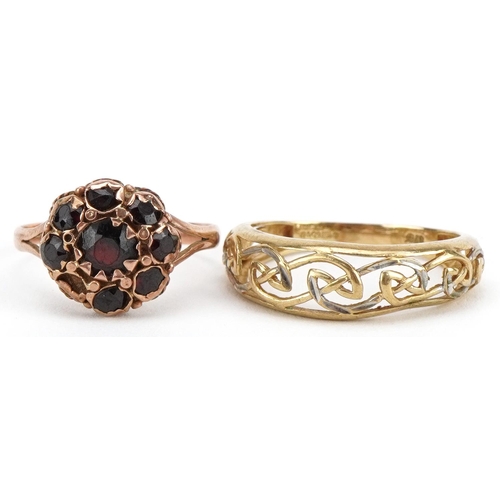 2143 - Two 9ct gold rings comprising a garnet cluster and two tone open work example, sizes O and R, total ... 