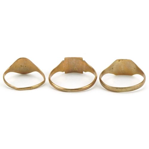 2174 - Three 9ct gold signet rings, sizes P, M and H, total 3.3g