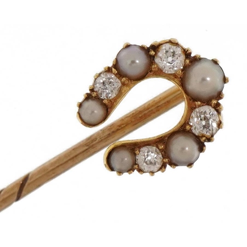 2044 - Victorian unmarked gold diamond and pearl horseshoe stickpin housed in a Mappin & Webb fitted tooled... 