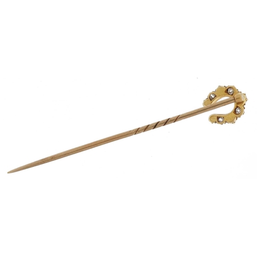 2044 - Victorian unmarked gold diamond and pearl horseshoe stickpin housed in a Mappin & Webb fitted tooled... 