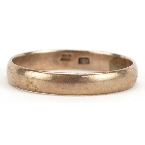 2064 - Gold wedding band, indistinct impressed marks, size O, 1.6g