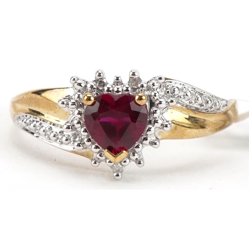 2243 - 9ct gold ruby and diamond love heart cluster ring, size U, 2.3g