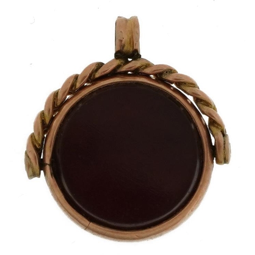 2134 - Antique 9ct rose gold bloodstone and carnelian spinner fob, 2.3cm high, 4.8g