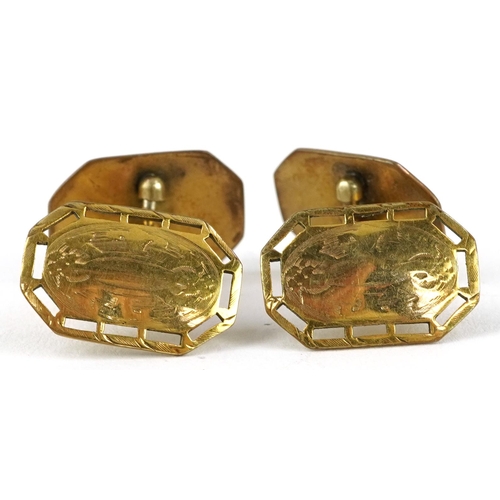 2379 - Pair of yellow metal cufflinks with pierced and engraved decoration, S&S makers mark, 1.7cm high, 5.... 