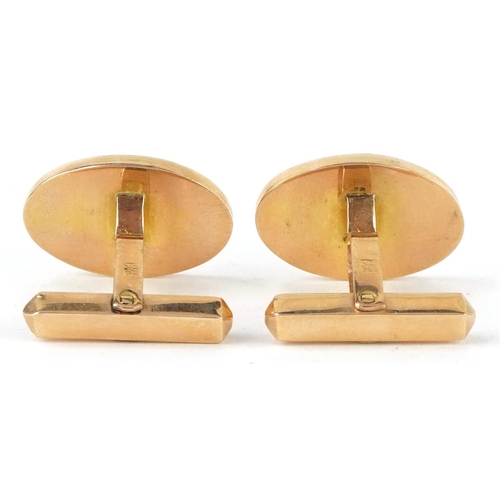 2041 - Pair of Chinese 18k gold cufflinks with character marks, 2.0cm high, 9.6g