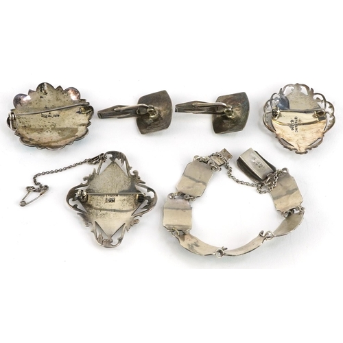 2257 - Silver jewellery comprising Siam panelled bracelet and matching cufflinks and three enamelled brooch... 