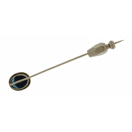 2381 - Unmarked white metal intaglio blue stone stickpin engraved with a bust, housed in a tooled leather b... 