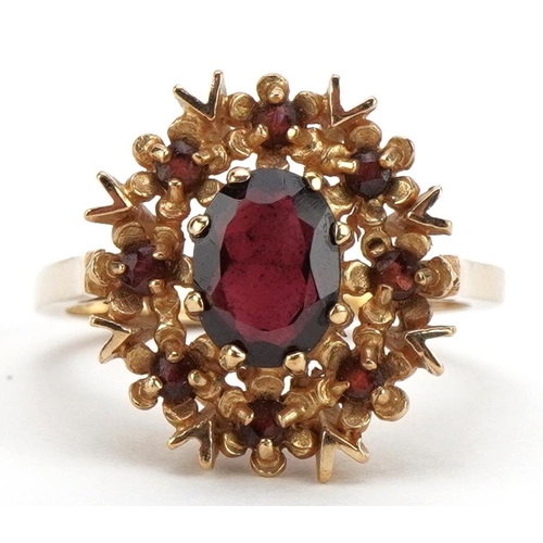 2086 - 9ct gold garnet cluster ring, size O, 4.1g