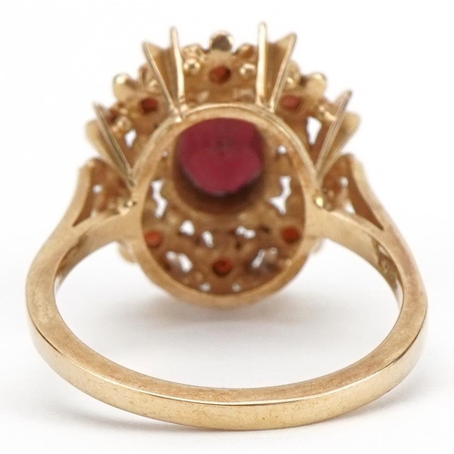 2086 - 9ct gold garnet cluster ring, size O, 4.1g