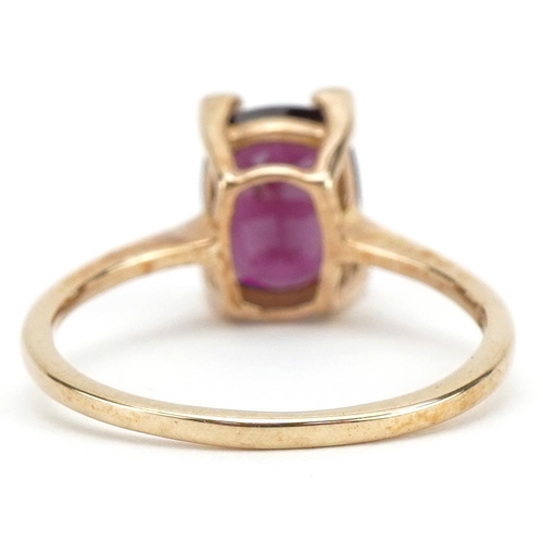 2201 - 9ct gold purple stone and diamond ring, size N, 2.2g