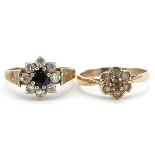 2221 - Two 9ct gold flower head rings, one set with a sapphire, sizes M and L, total 4.0g