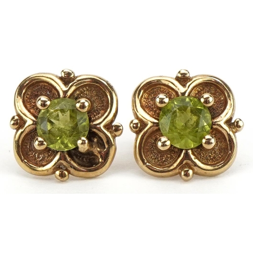 2236 - Pair of 9ct gold topaz stud earrings with silver butterflies, 1.2cm in diameter, weighable gold 2.3g