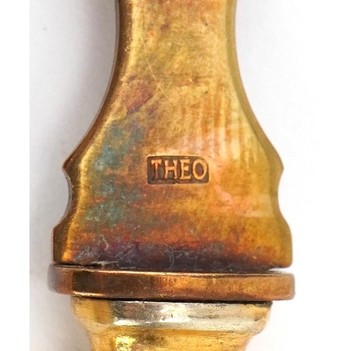 1245 - Set of twelve gilt metal spoons impressed THEO housed in a fitted case, 16.5cm in length