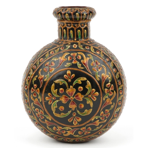 1315 - Turkish wrought iron flower vase enamelled with stylised flowers, 20cm high