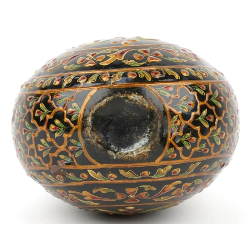 1315 - Turkish wrought iron flower vase enamelled with stylised flowers, 20cm high