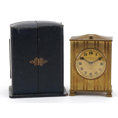 505 - Zenith, Art Deco brass cased travel alarm clock with velvet lined case, the clock retailed by Arnold... 