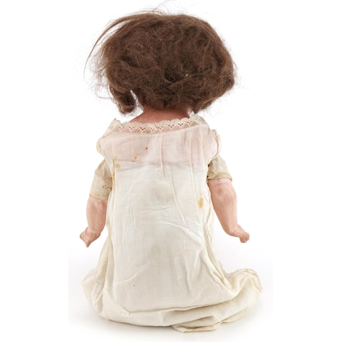 1385 - Vintage composite doll with open close eyes, 44cm high