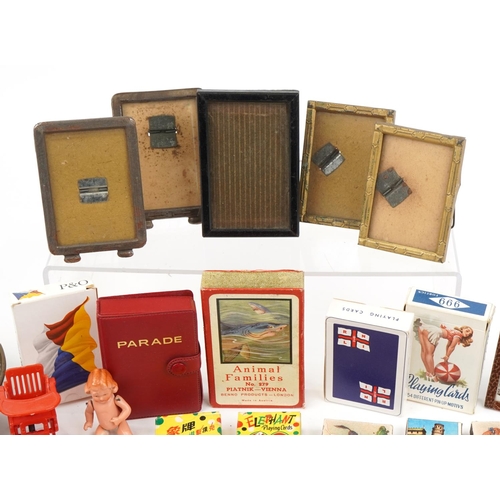 657 - Sundry items including photo frames, playing cards, miniature German porcelain doll, padlocks and an... 