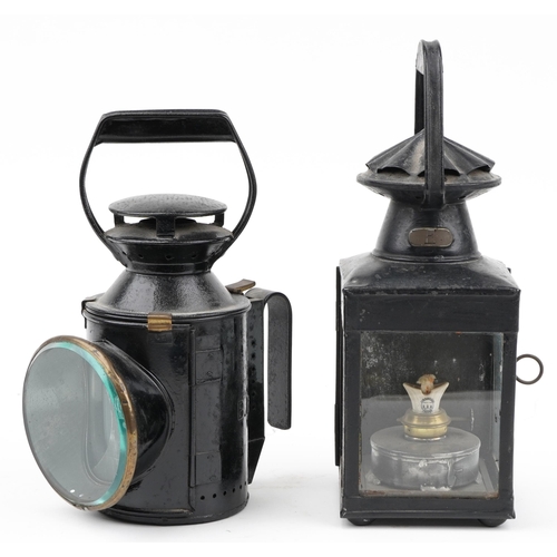 387 - Two British Railway lanterns with Sherwood burners, the largest 33.5cm high