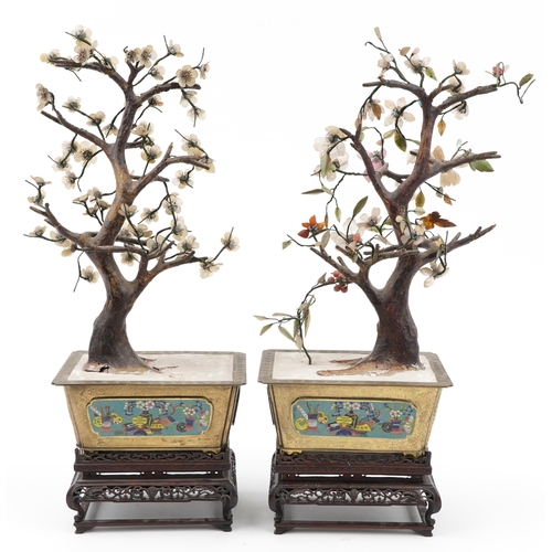 15 - Good pair of Chinese hardstone bonsai trees housed in engraved brass planters with cloisonne panels ... 