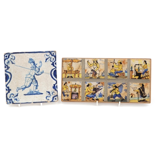 543 - Delft tiles including a blue and white example hand painted with a horn blower, the largest 23cm x 1... 