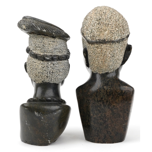 582 - Pair of African carved green hardstone busts of tribesmen, each approximately 26cm high